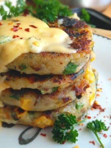 Spicy Potato Cakes with Creamy Cheese Sauce