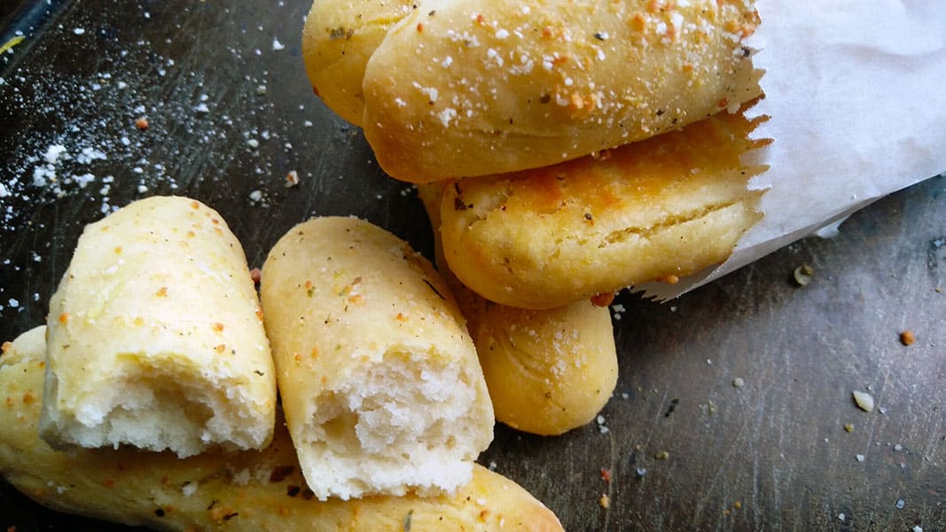 Yeast-free and no-knead, these 3 ingredient  Garlic Breadsticks is one of my easiest and quickest bread type recipes ever.