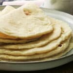 When you need a quick and easy side dish for dinner, this 3 ingredient yogurt flatbread recipe comes to the rescue. Made without yeast, yet so soft and pliable these are perfect as a sandwich wrap, or quick pizza base, or naan alternative.