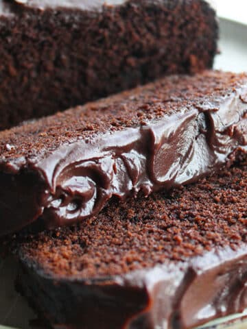 This Chocolate Sour Cream Cake is rich, decadent, and has amazing texture and flavor. Topped with silky chocolate frosting, this bake is sure to satisfy your chocolate cravings! It's perfect for your any day treat or makes a beautiful celebration cake that's sure to impress.