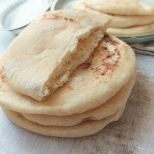 Soft pita bread cooked on the stovetop with a fluffy interior and pocket