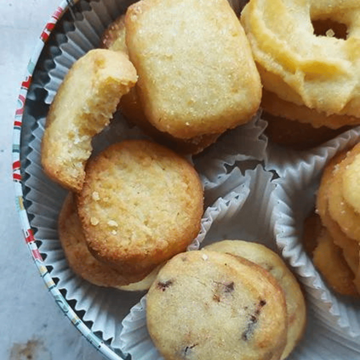 assorted Danish Butter Cookies are made using one dough with 5 variations. Inspired by the classic Royal Danish butter cookie tins these include vanilla ring, the pretzel cookie, country style, coconut and rectangular sugar sprinkled cookie.