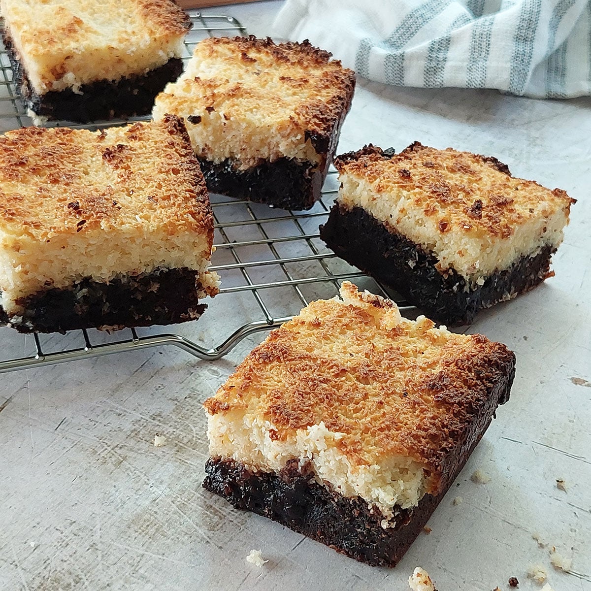 Rich fudgy chocolate brownies baked with crisp chewy coconut topping - now that's what I call pure decadence!