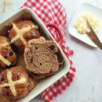 Traditionally, these sweet, spiced buns are made with yeast, which requires kneading and long rise time for the perfect texture.