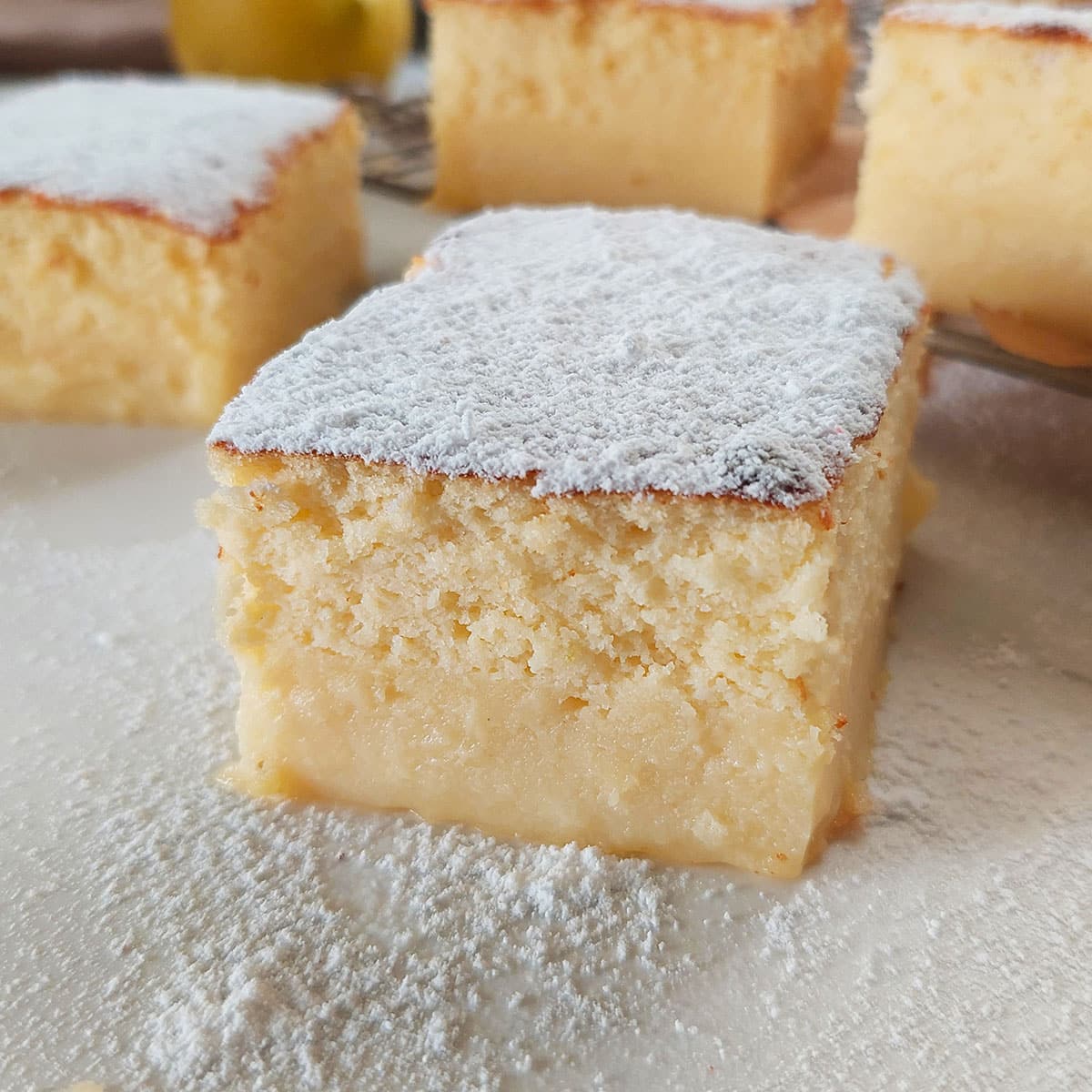 Made up of one simple batter this Lemon Magic Custard Cake ends up in a beautiful cake with three different textures.