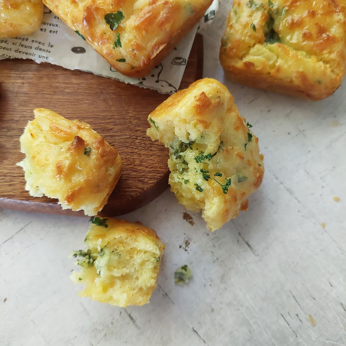 Little cubes of garlic butter are nestled in the batter before baking.