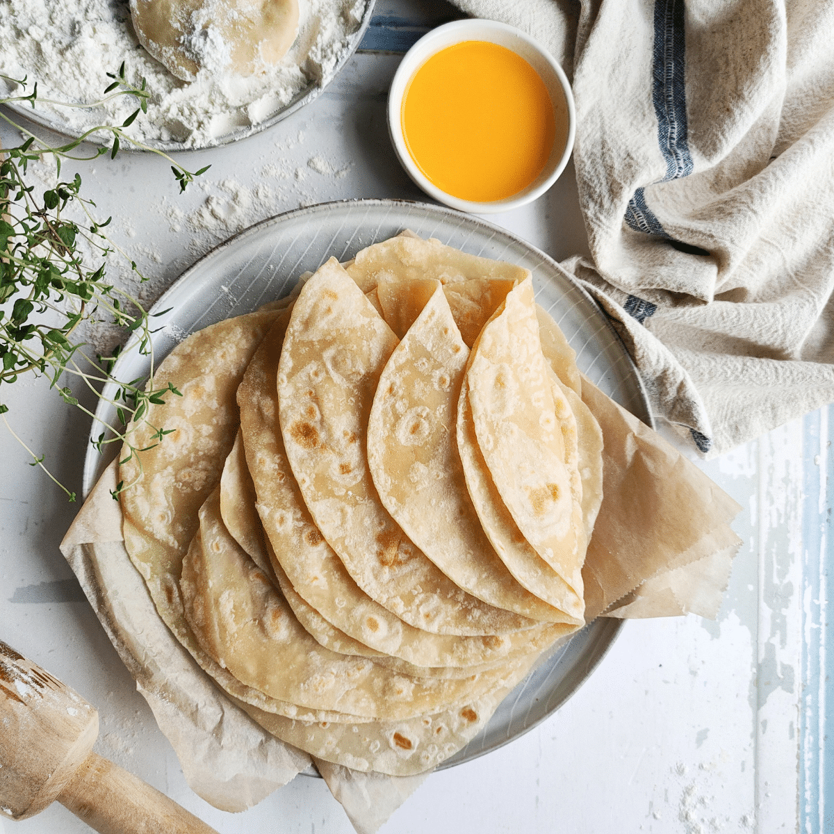 Easy, Soft Indian Flatbread also known as roti or chapati pairs perfectly with your favorite curry dishes. Made with just 4 ingredients, they're quick and simple to make. And the best part is, you don't need yeast!