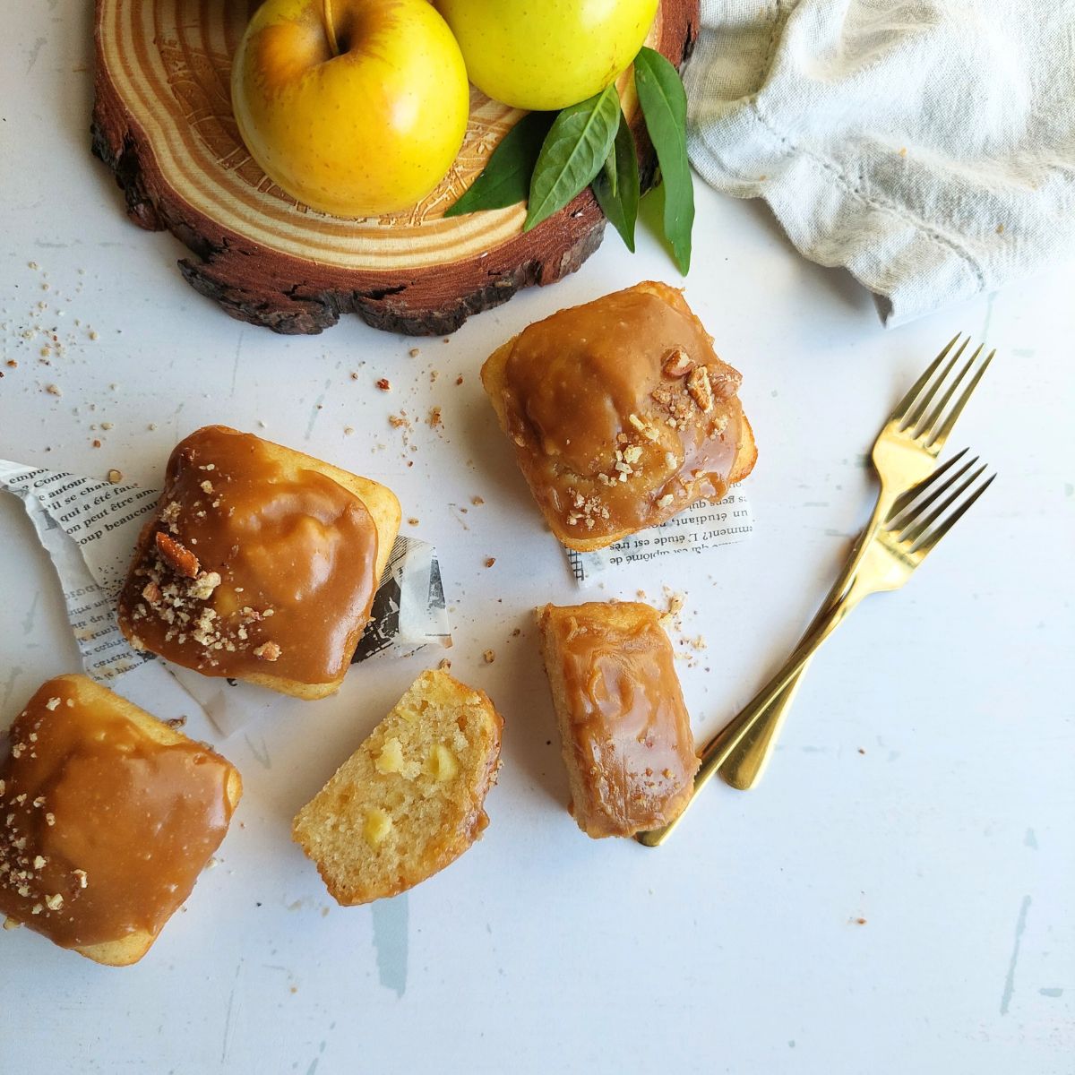 Apple snack cakes -for a sweeter treat, frost with a simple caramel glaze, made from brown sugar and heavy cream. Made in under 10 minutes, it's so much simpler to make than classic caramel but just as tasty.