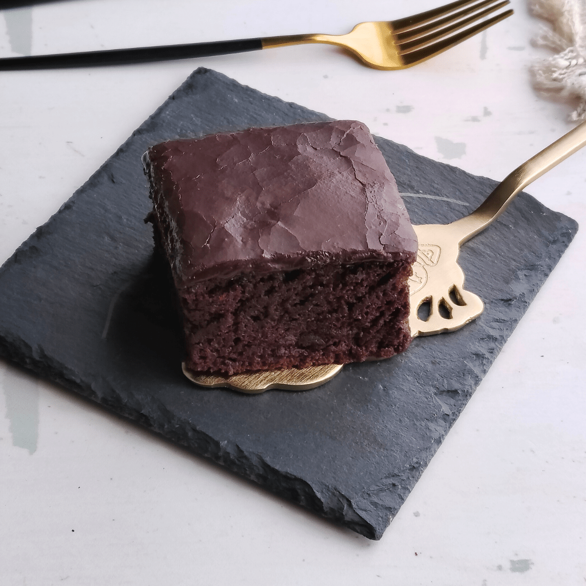 This Egg-Free Coca-Cola Chocolate Cake is just right - not overly sweet. It's like a blend of brownie and soft cake.