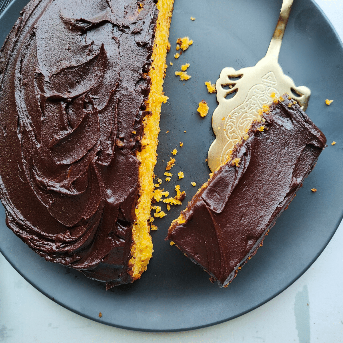 The cake is wonderfully fluffy and delicate, plus the carrots give it a stunning orange color. 