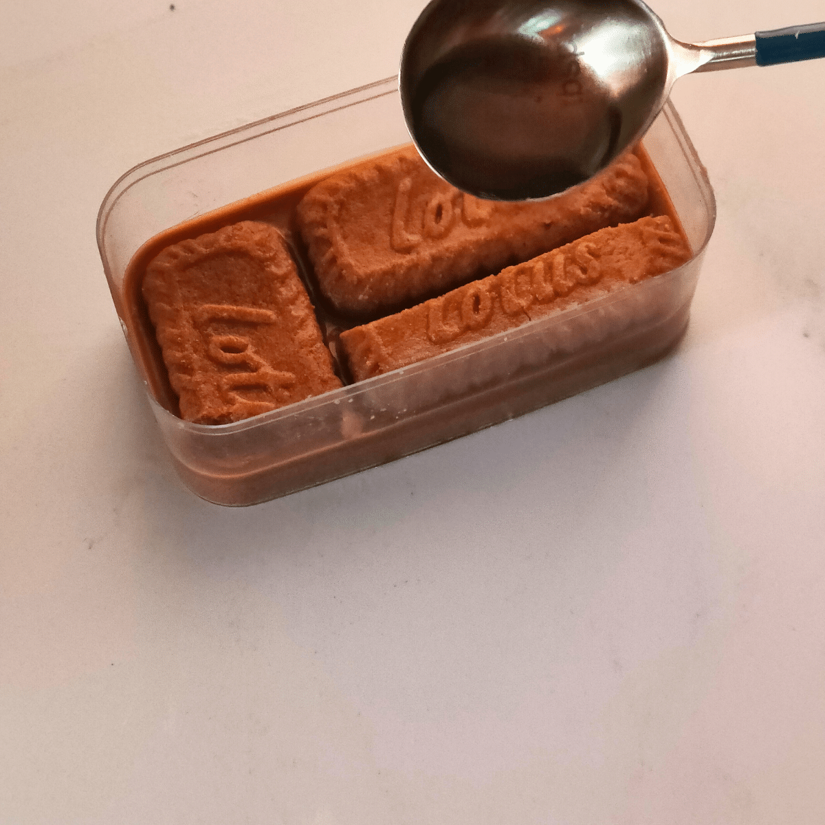 Pour coffee over cookies