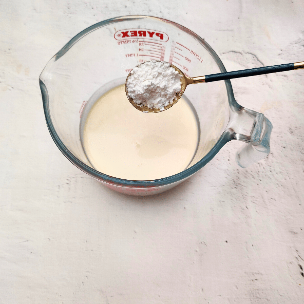 combine heavy cream and powdered sugar