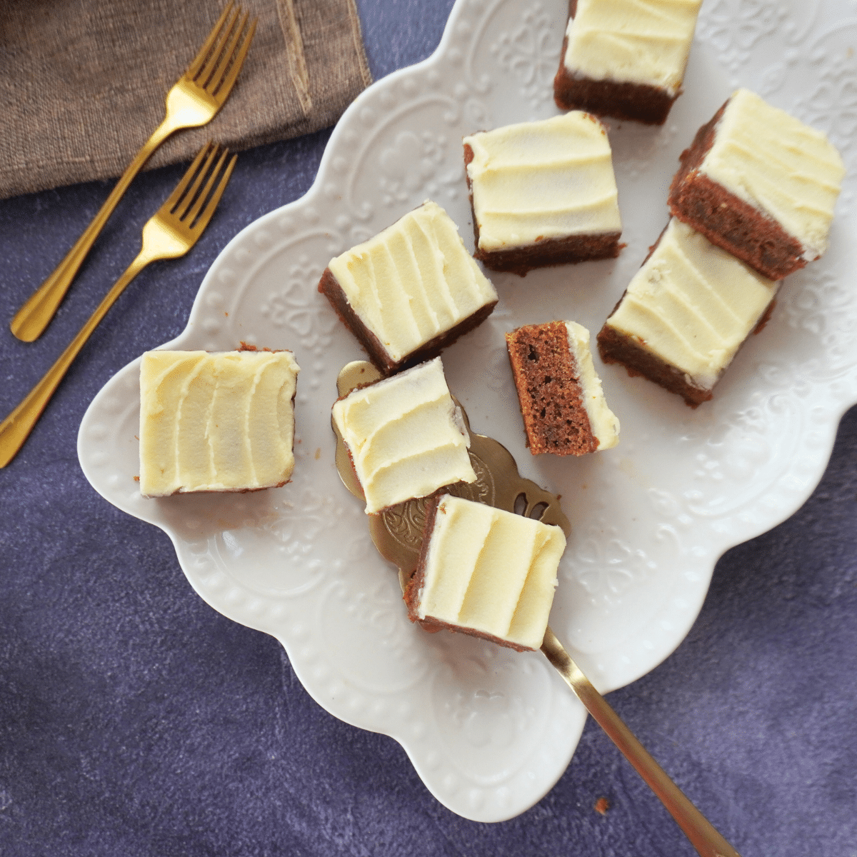 Date Cake bars, a dessert that blends the caramel like taste of dates, with a sugary frosting.