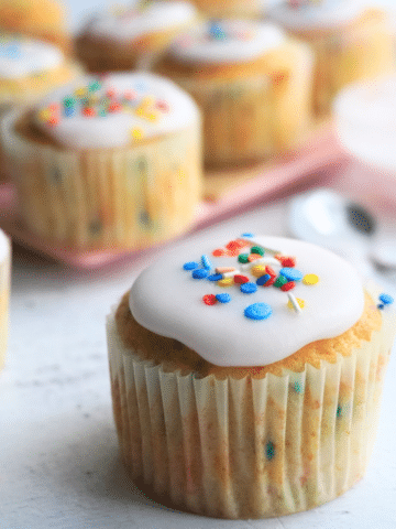 funfetti cupcakes on a pink plate