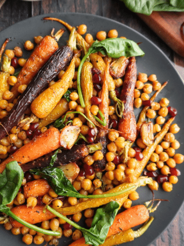 Honey Roasted Carrots & Chickpeas (garbanzo beans) is a delicious side dish that can double as a light vegetarian main course. It’s a great mix of sweet, savory, and crunchy, and goes perfectly with roasted meats, grilled dishes, or grains like quinoa and couscous.