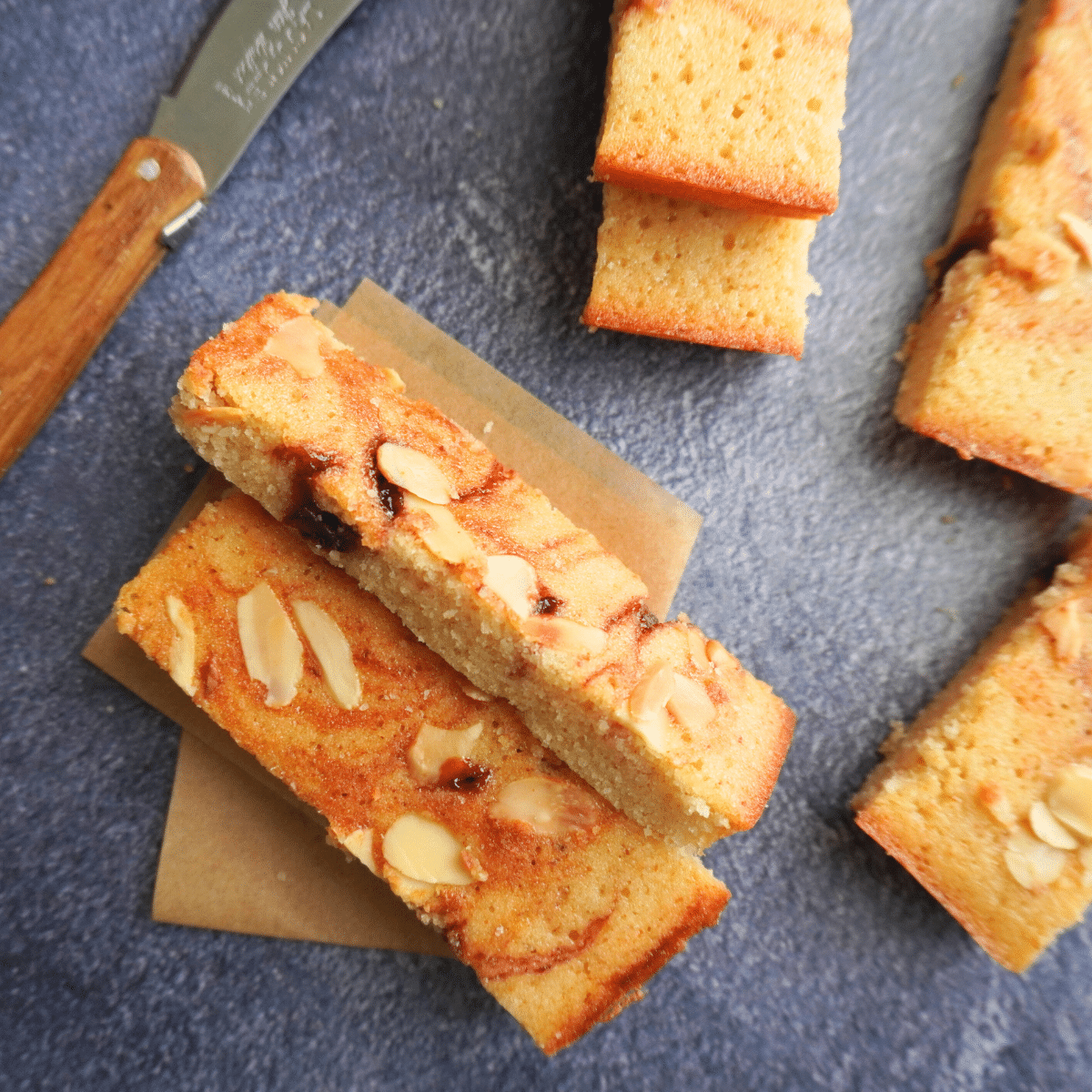 Originally baked in small molds, they quickly became a favorite in French bakeries and remain popular even today.