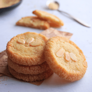 These Marzipan Butter Cookies are rich with crisp edges and a chewy center. Packed with almond flavor and finished with sugar-coated edges, they’re elegant and easy to make with either homemade or store-bought marzipan.
