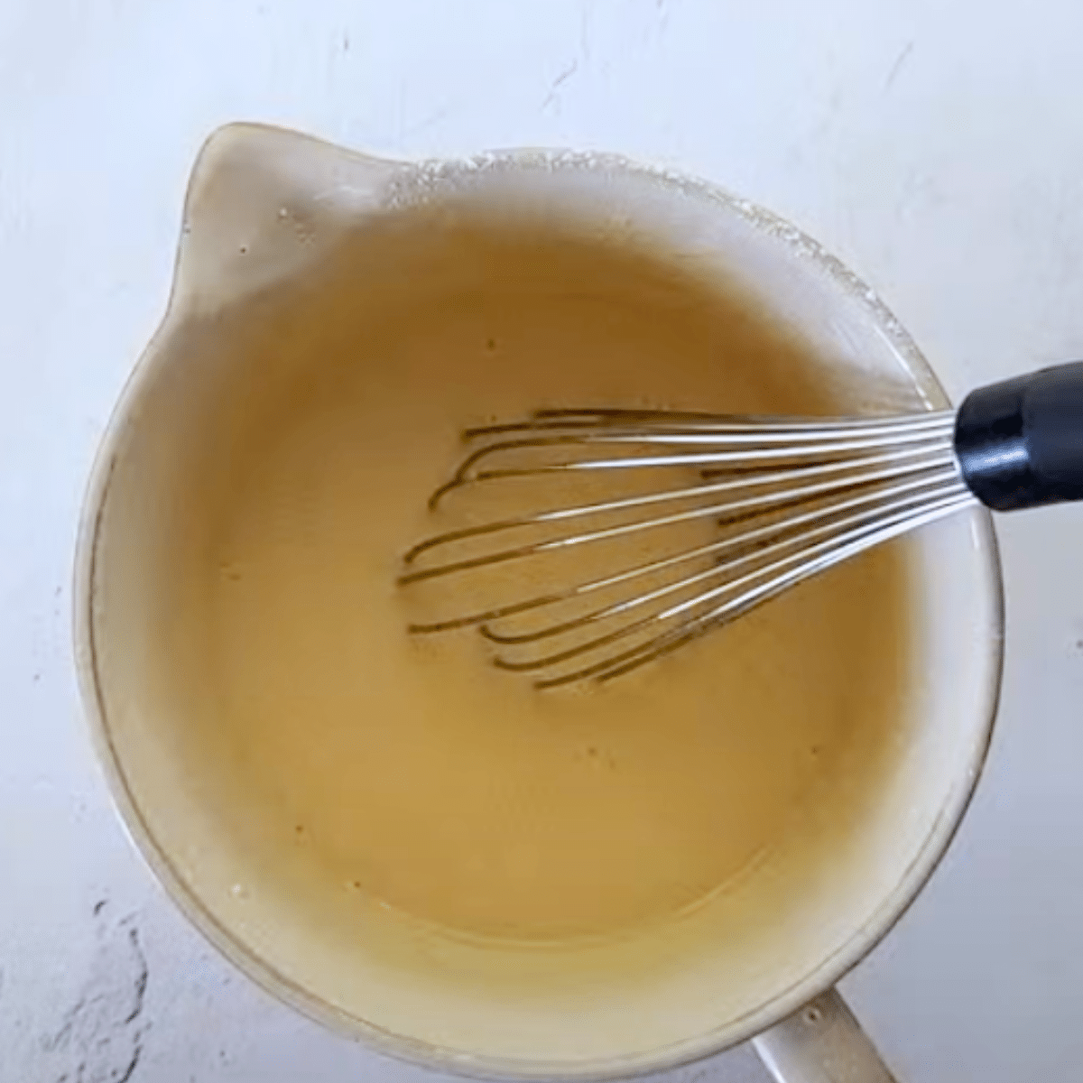 Whisk gently just until no lumps of flour remain—don’t overmix