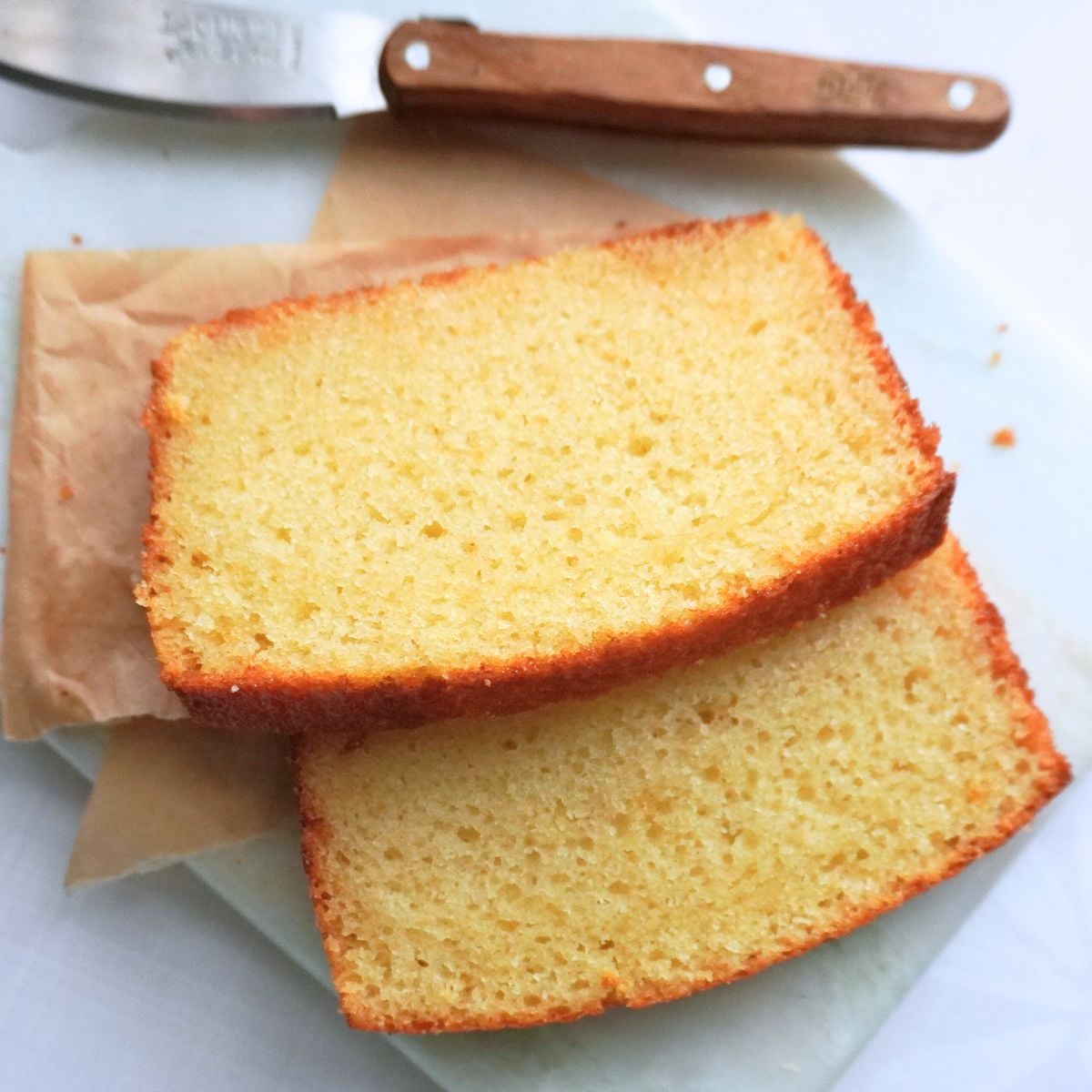 slices of butter cake on parchment