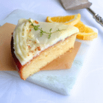 slice of almond flour cake on a marble plate