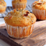 Soft and golden trail mix muffin topped with chopped nuts and seeds, perfect for easy egg-free breakfasts or snacks