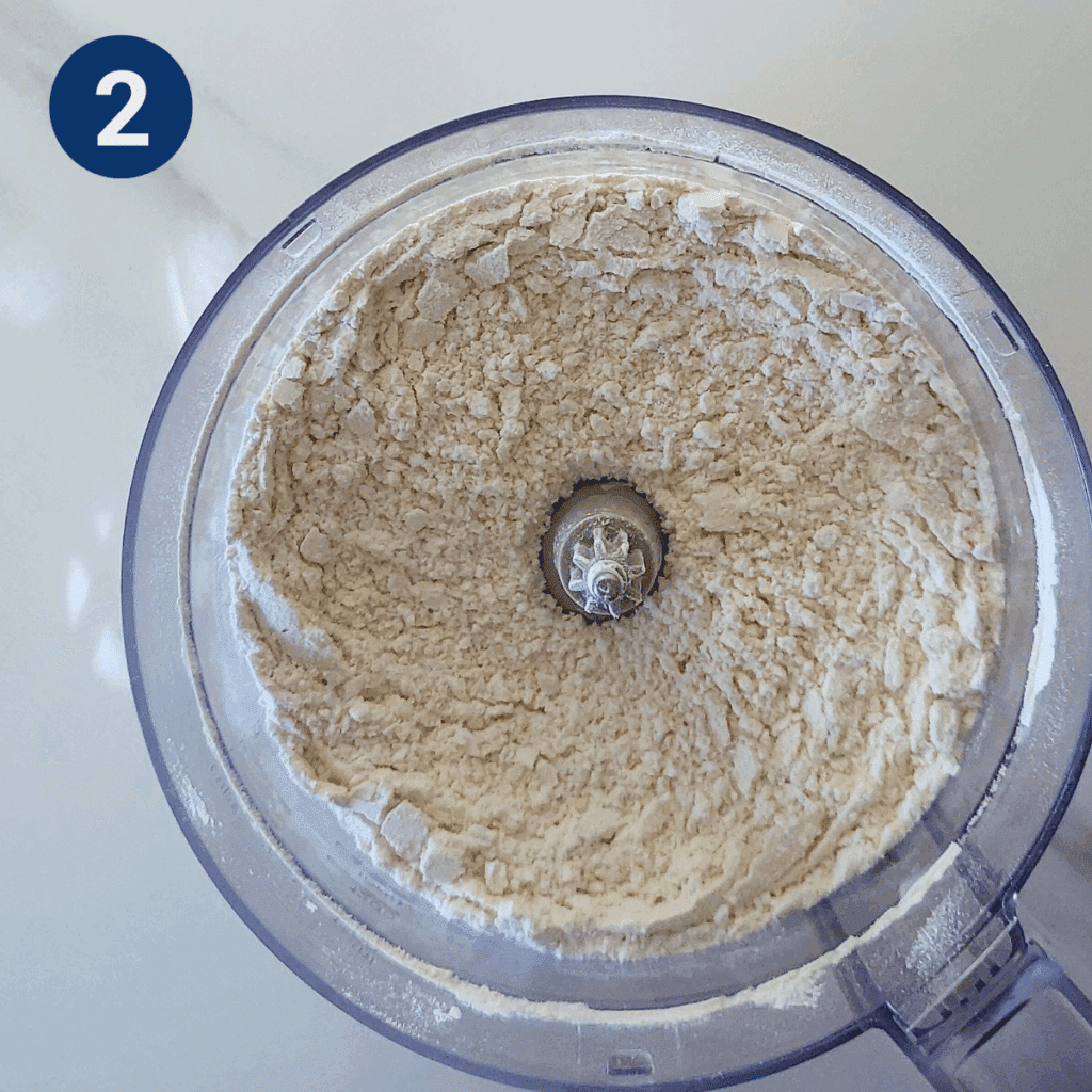 Butter pulsed into flour mixture until crumbly