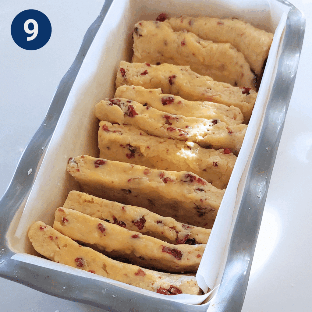 Dough pieces arranged upright in lined loaf pan