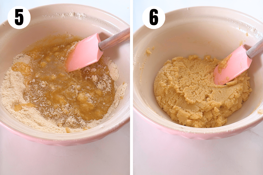 Wet and dry ingredients being mixed with a pink spatula into a soft dough.