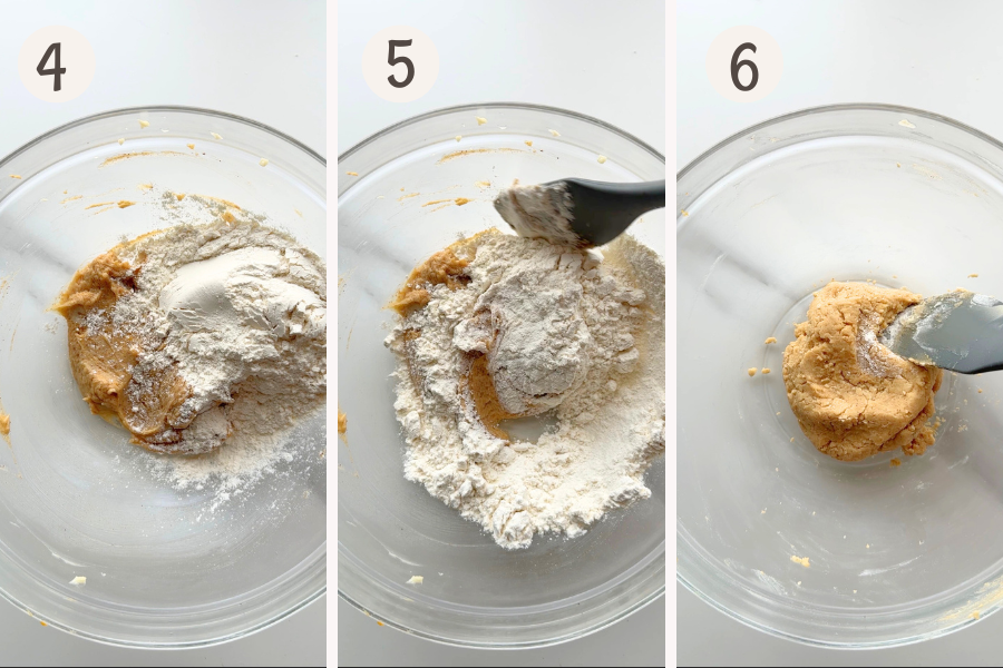 Mixing flour into pumpkin cookie dough until smooth.