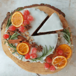 Easy Christmas Fruit Cake (no eggs-no butter) decorated on serving board