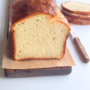 Greek yogurt bread with no yeast, sliced to show soft interior and golden crust