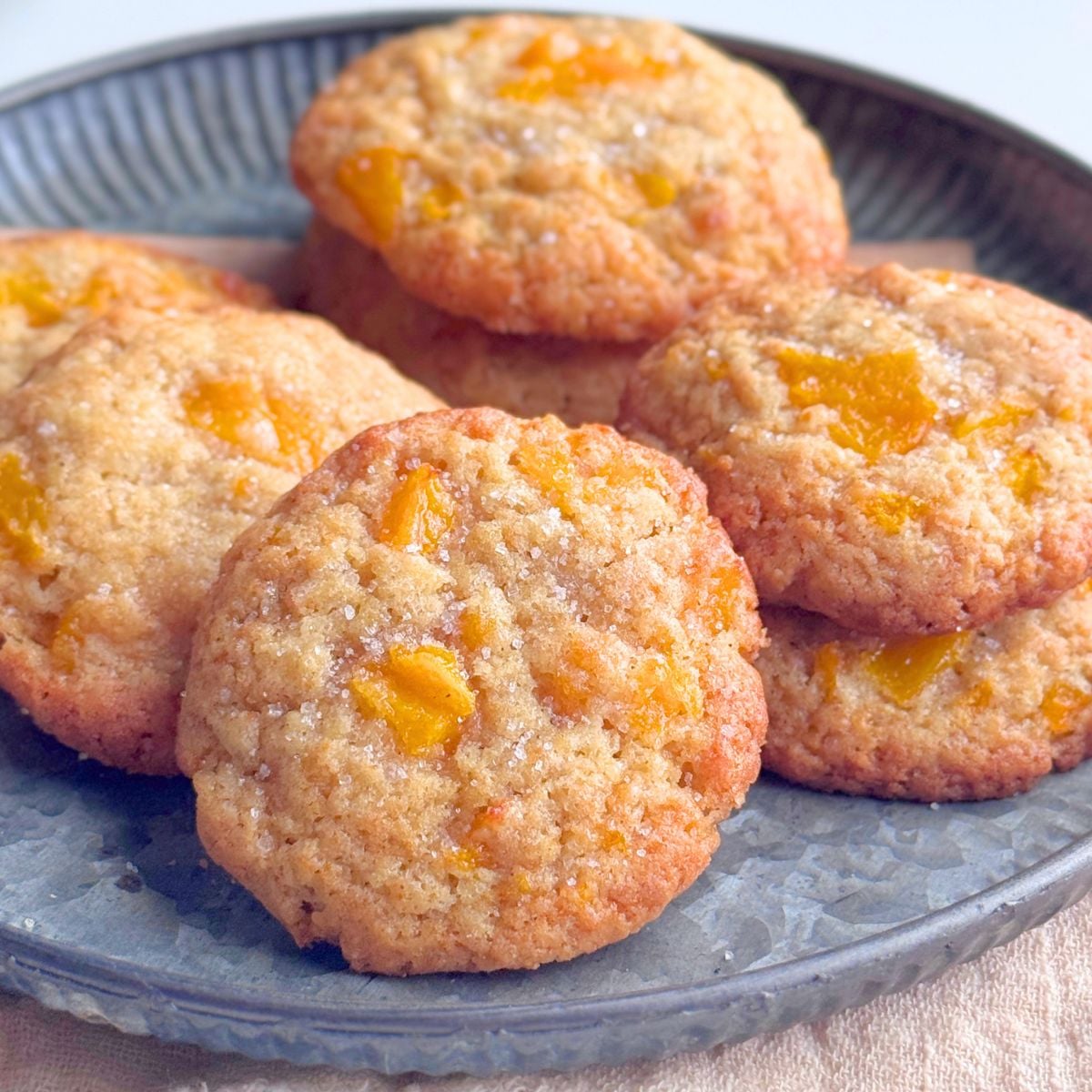 Soft peach cookies made with fresh or canned peaches on a plate.
